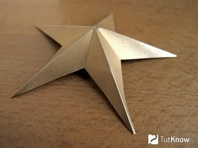 Decorative star made of tin cans