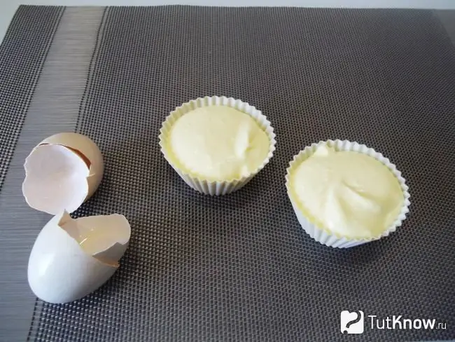 Ice cream is poured into molds and sent to the freezer