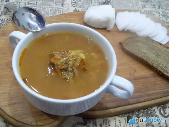 Ready-made pea duck soup seasoned with fresh herbs