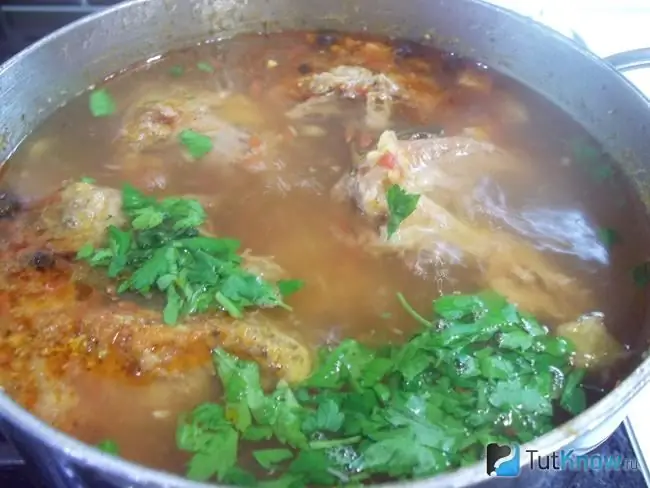 Ready-made pea duck soup seasoned with fresh herbs