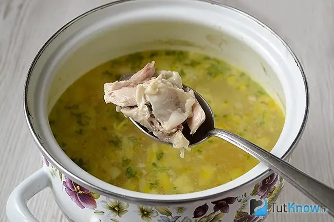 Adding chicken to soup