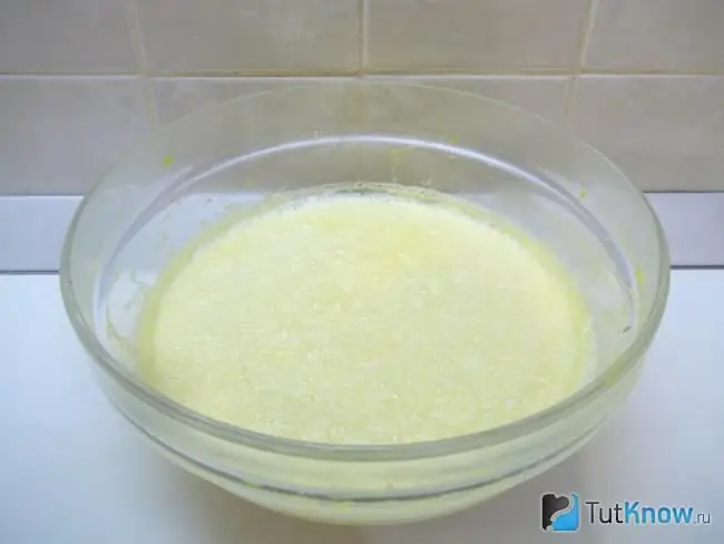 Prepared milk liqueur with raw egg yolk and ice cream