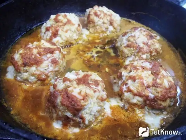 The meatballs are turned over to the other side and further stewed