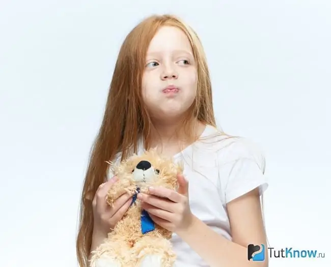 Kinesthetic child with soft toy