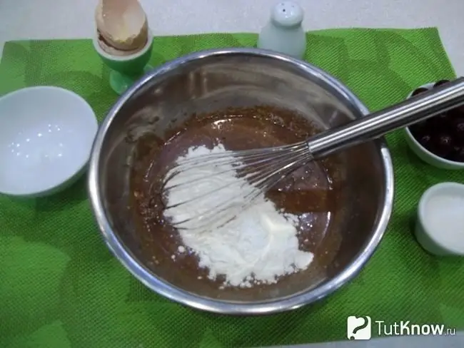 The products are mixed and flour is added