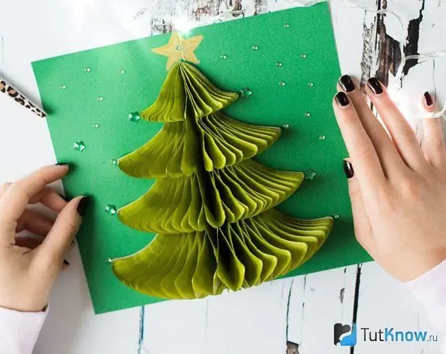 Volumetric card with a Christmas tree