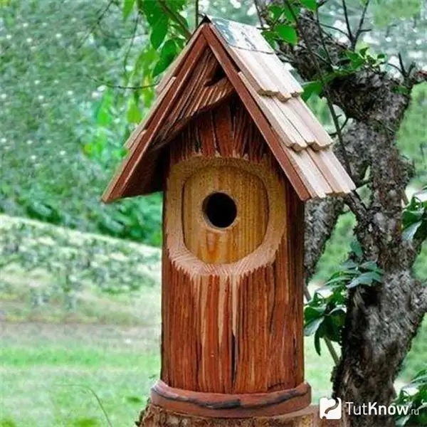 An example of a house for a squirrel from a log