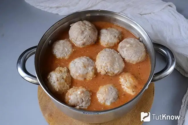 Ready meatballs with rice in tomato sauce