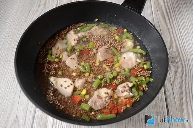 Buckwheat is cooked in a pan