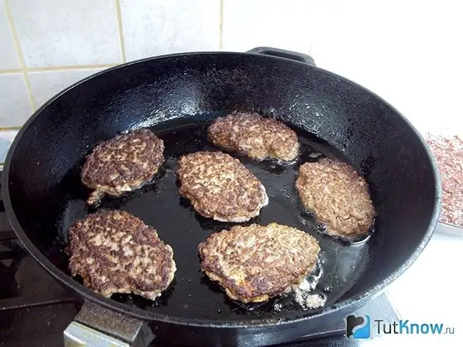 Cutlets are fried in a pan