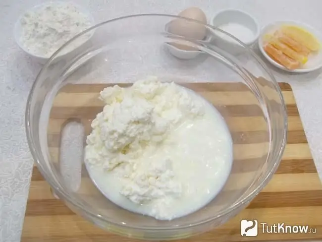 Kefir is poured with cottage cheese