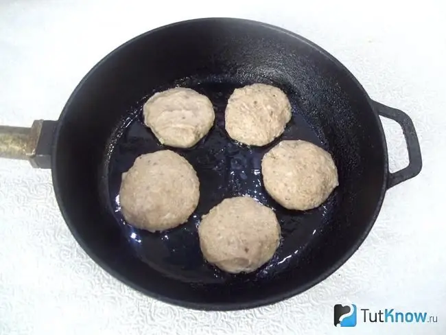 The meatballs are fried in a pan