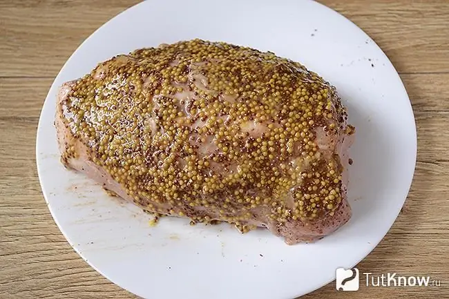 Coat the meat with French mustard